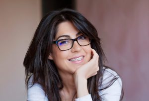 Young woman with braces - orthodontics in Swansea, IL